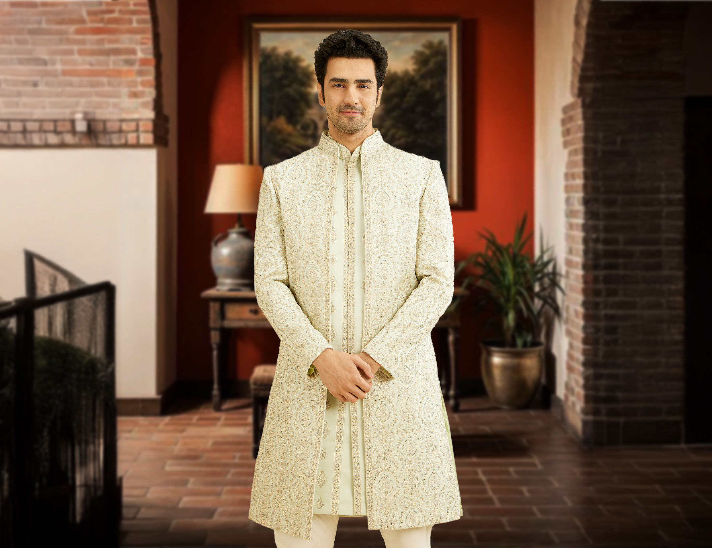 A light green pastel colour sherwani for groom